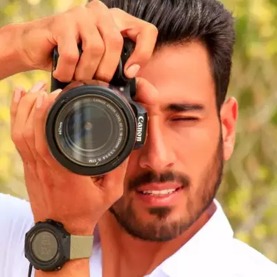 آقای حکمتی - عکاس کیش
