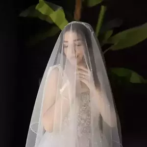 عکس عروس با تور عروس روی سرش